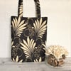Fern tote bag in dark brown with fern and scrolled stem pattern in beige