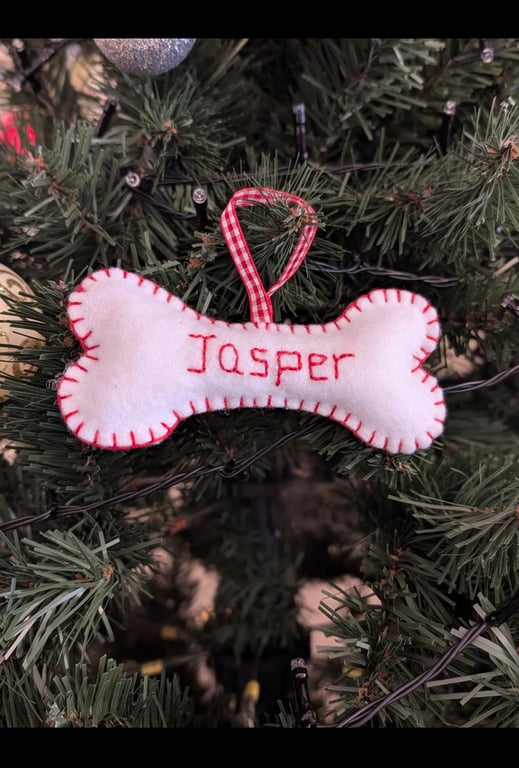 Handmade handsewn felt dog bone with personalised dogs name. 