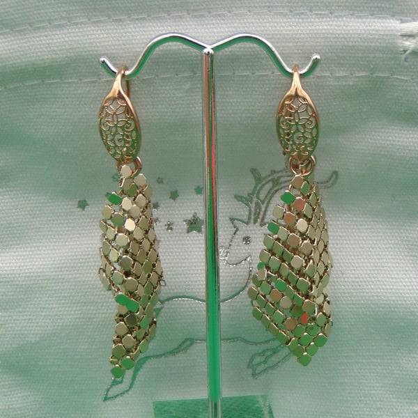 Metallic  rose gold material earrings   