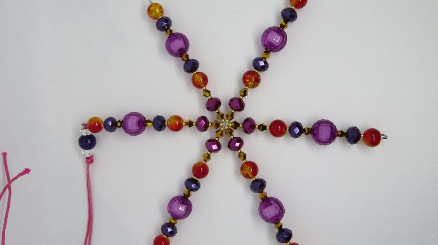 Large jewel tones snowflake or suncatcher