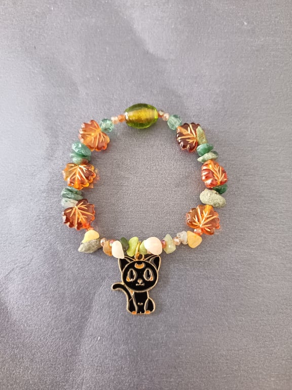 Elasticated Autumnal leaf and black cat charm bracelet 