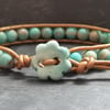 SALE Turquoise jasper and bronze leather bracelet with ceramic flower button 