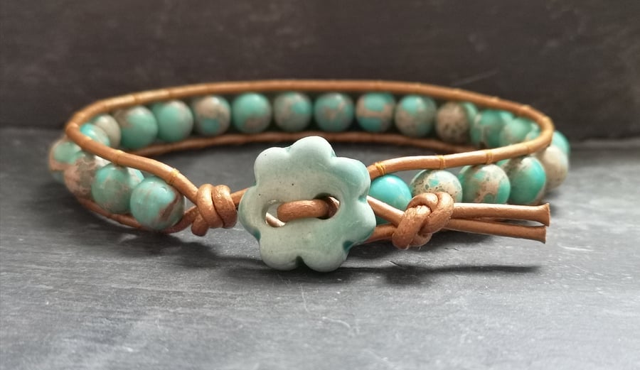 SALE Turquoise jasper and bronze leather bracelet with ceramic flower button 