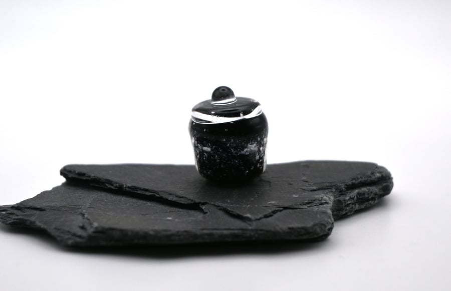 small glass jar of magic