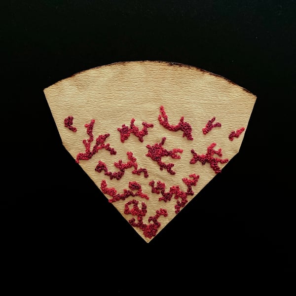 Hand stitched upcycled coffee filter embroidery art
