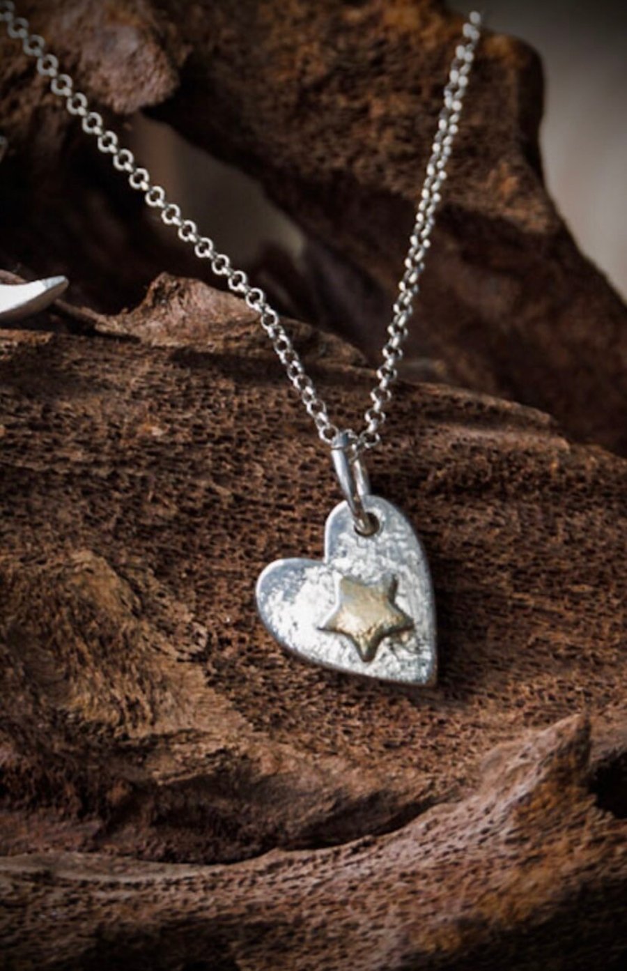 Handcrafted silver heart with embossed gold star pendant