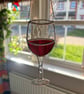 Everlasting Red Wine suncatcher in stained glass