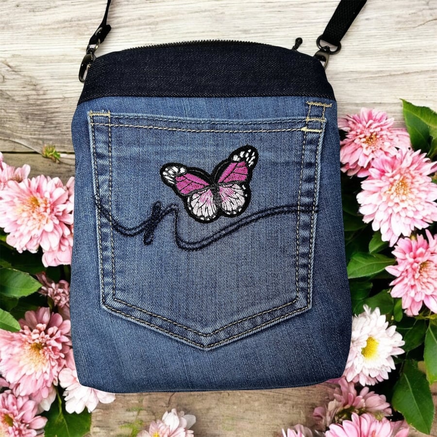 Upcycled denim bag with pink butterfly
