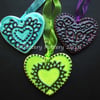 Set of three ceramic heart decorations