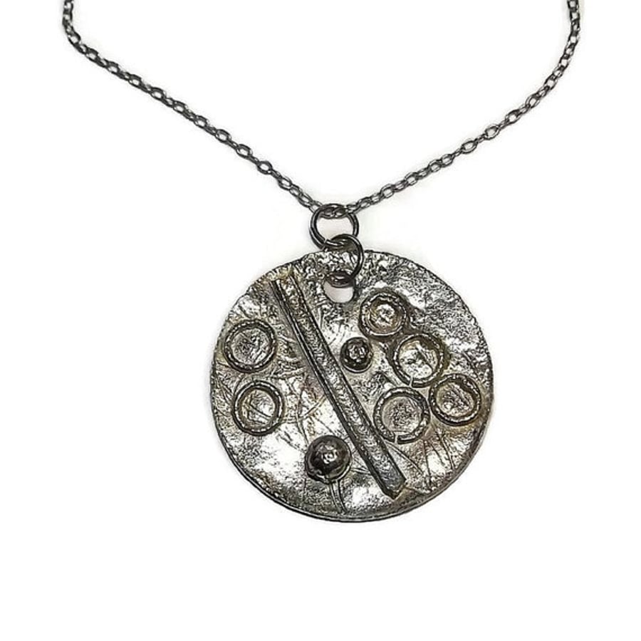 sterling silver disc pendant