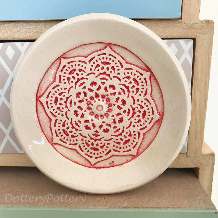 Small ceramic trinket dish with lace pattern red