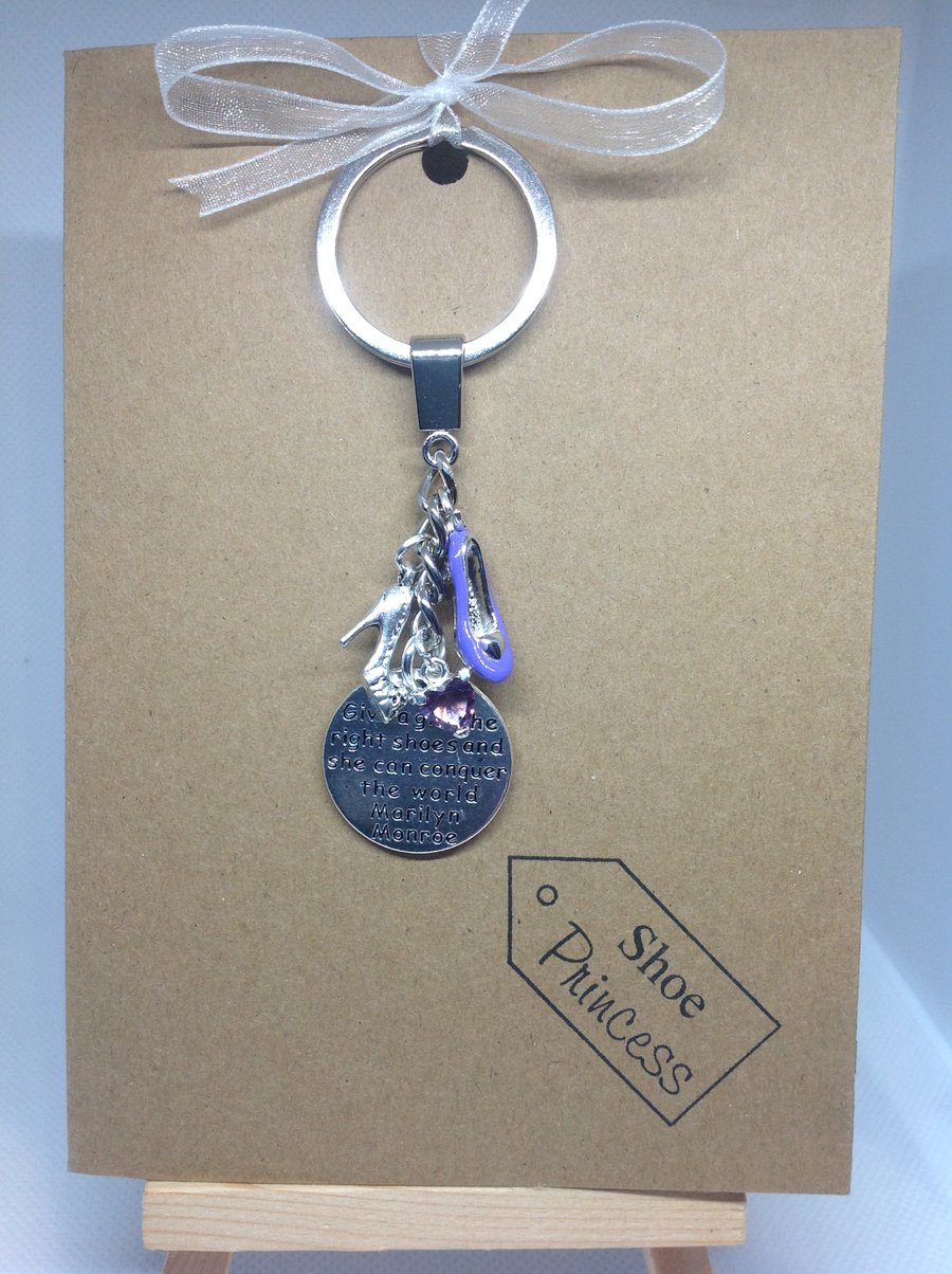 Shoe themed keyring attached to a Kraft greetings card
