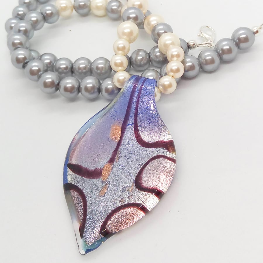 Blue Teardrop Glass Pendant on a Grey and Cream Pearl Beaded Necklace