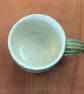 Stoneware pottery mug finished in a muli-colour green glaze - Image 3