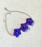 Handmade purple flower bracelet - Image 1