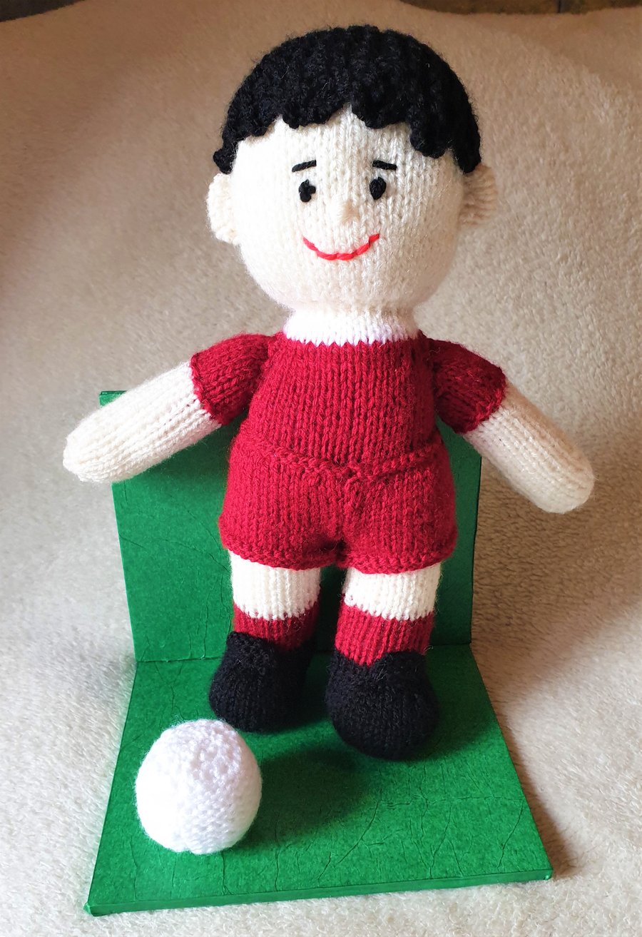 Footballer on stand, collectable knitted figure