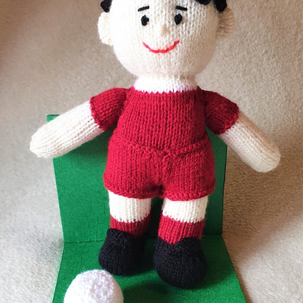 Footballer on stand, collectable knitted figure