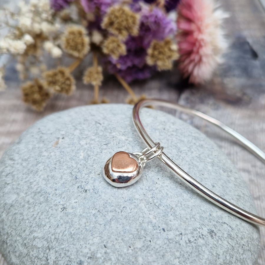 Sterling Silver Round Bangle with Pebble Copper Heart Charm