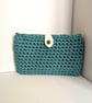 Handmade lined turquoise crochet t-shirt yarn clutch or over shoulder bag - Image 1