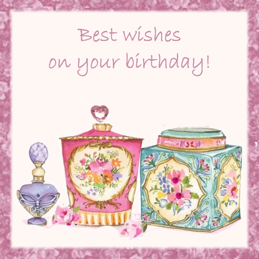 Female birthday card, decorative jars and perfume