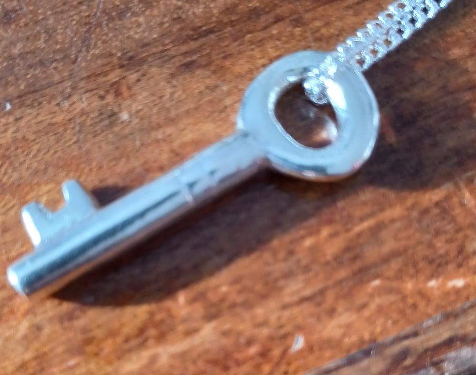Silver key pendant