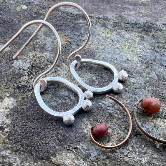  Silver Seed Pod Mismatched Dangle Earrings