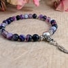 27 bead purple agate mala bracelet with feather charm and silver accents