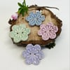 Set of four flower shaped ceramic handmade buttons pastels