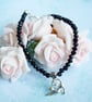 Black Bead Bracelet with Stretching Cat Charm - Image 2
