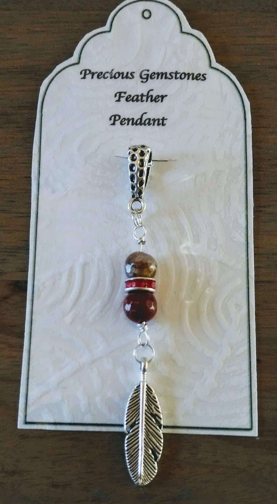  Silver metal feather pendant with agate gemstones