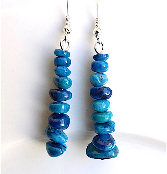Earrings for pierced ears, sensational blue coral dangles.