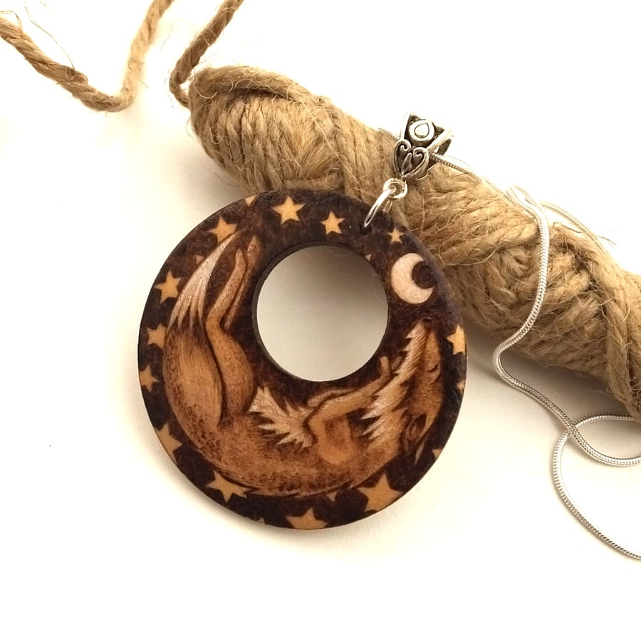 The fox and the moon. Circular wooden pyrography pendant. British wildlife