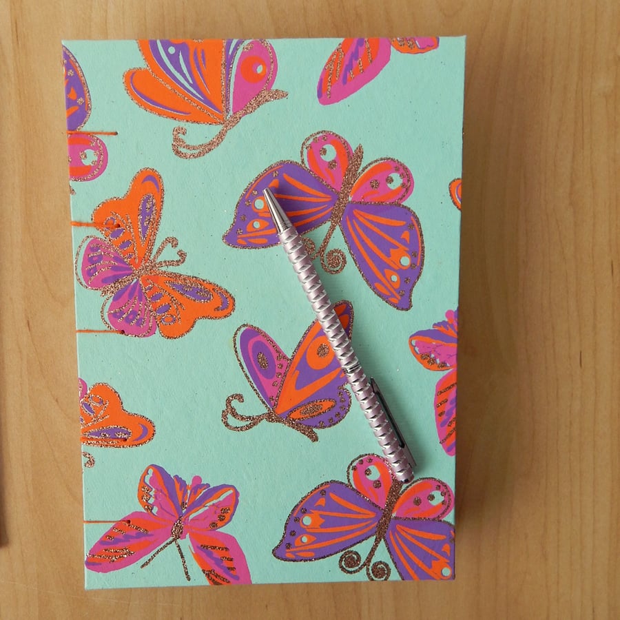 Rainbow Butterfly Journal with Handmade paper in Rainbow colours 