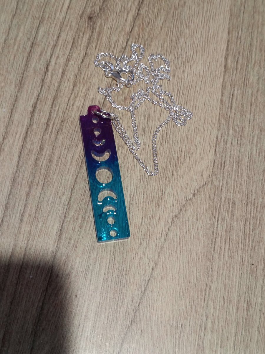 Beautiful handmade necklaces from resin with silver chain.  Pretty gift 