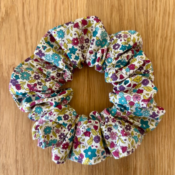Cotton scrunchie hair accessory in colourful floral print