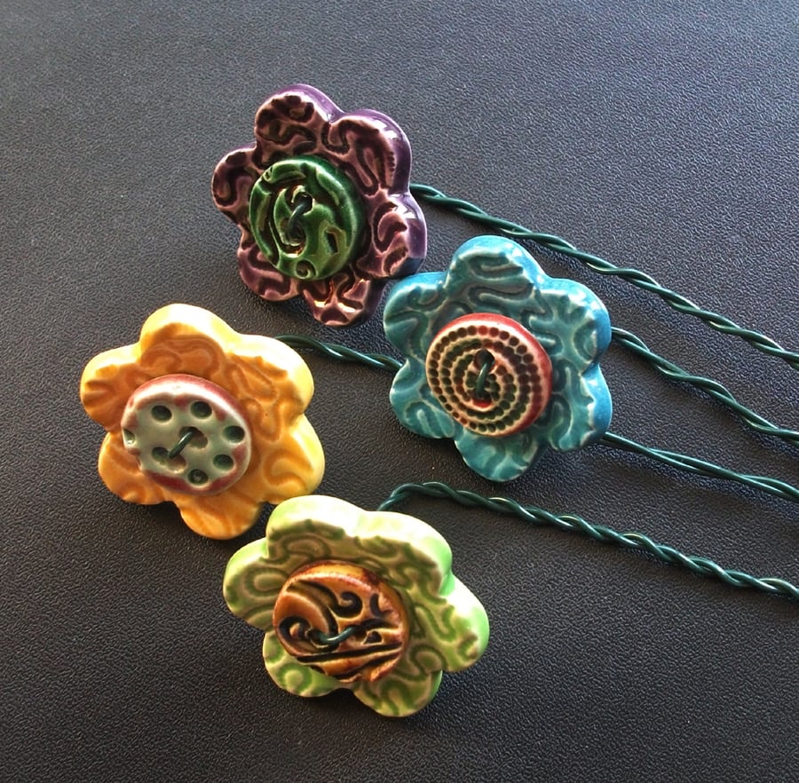 Set of four ceramic button decorative flowers