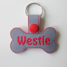 641. Westie bone shaped keyring.
