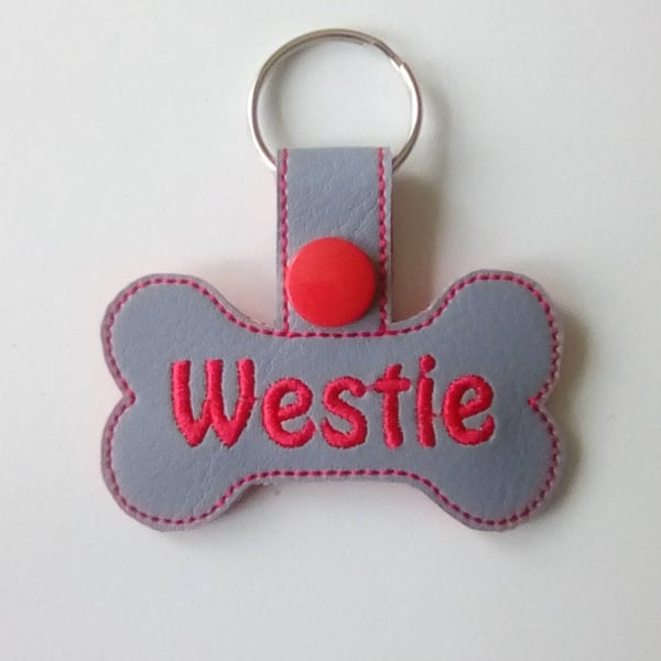 641. Westie bone shaped keyring.