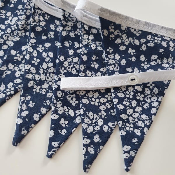 Delicate Blue and White Floral Bunting on White Binding