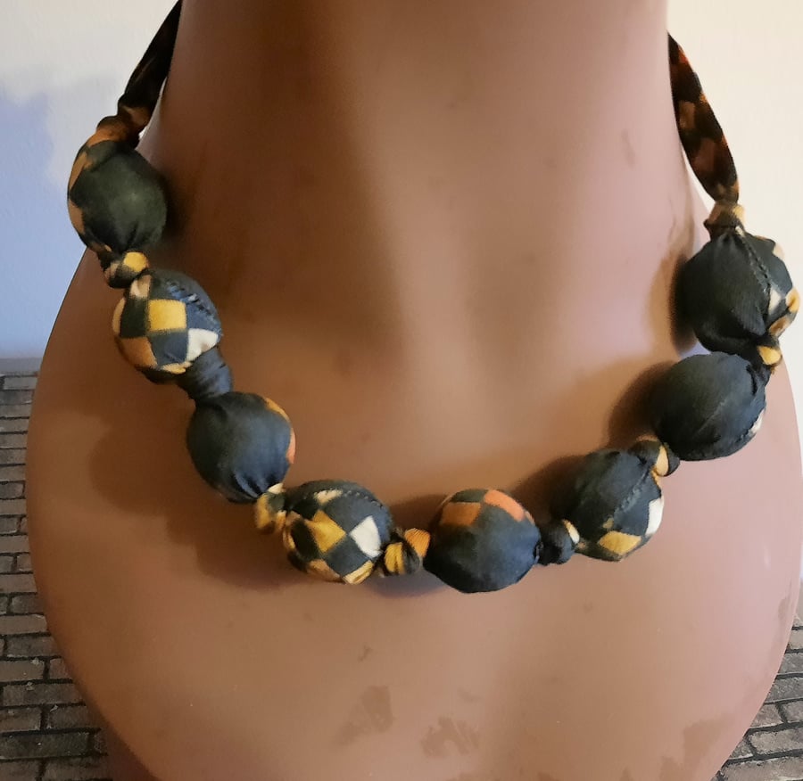 Black and Orange Patterned Fabric Covered Beaded Necklace