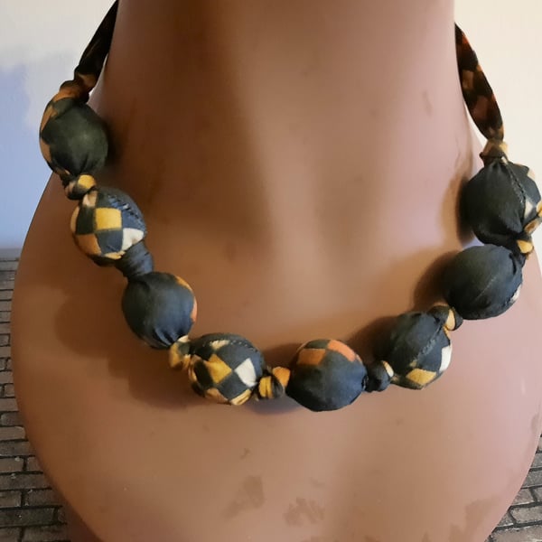 Black and Orange Patterned Fabric Covered Beaded Necklace