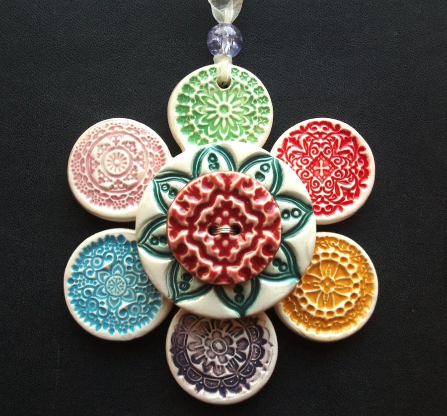 Ceramic flower decoration with button detail