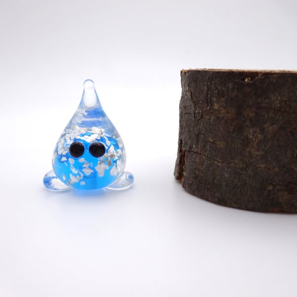 small glass wisp figure