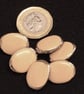 Vintage Buttons: Latte Coloured Center, Golden Rim, Oval 6x19mm - Image 1