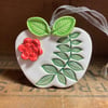 Reduced ceramic apple decoration