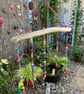 Driftwood and beaded mobile