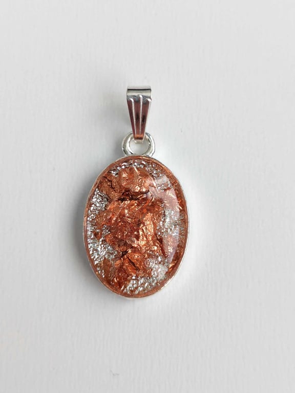 Small Oval Pendant With Copper Coloured Flakes