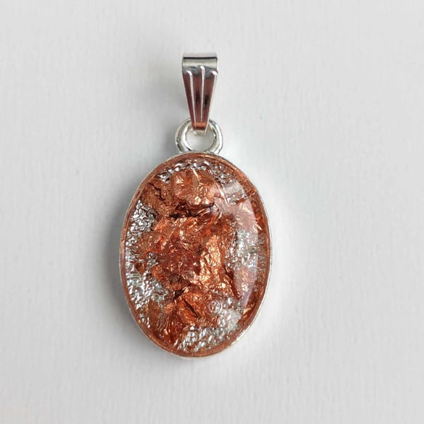 Small Oval Pendant With Copper Coloured Flakes