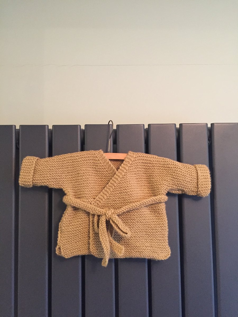 Hand knitted baby wrap cardigan - caramel