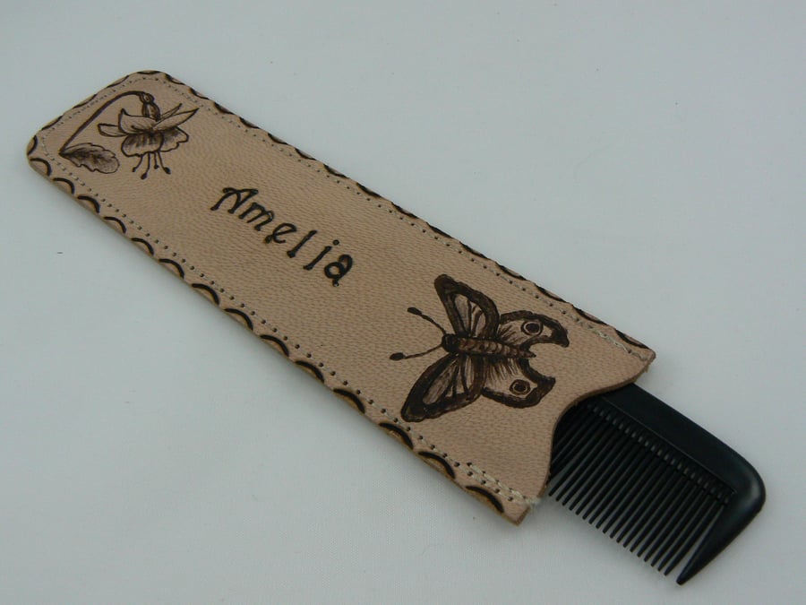 Comb in leather case with name